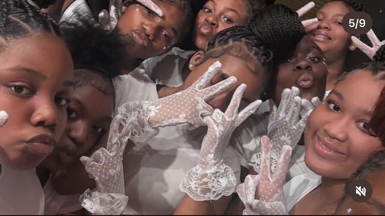 Dancers posing with lace gloves